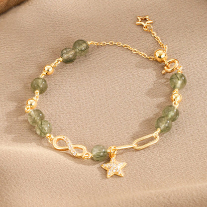 Pulsera de protección de estrellas de amor eterno con lazo de Möbius de cuarzo rutilado verde en oro de 14 quilates de Buddha Stones 