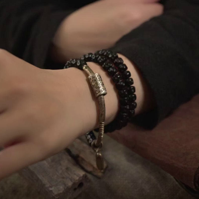 Pulsera de triple vuelta de cobre con cáscara de coco retro de Buddha Stones 