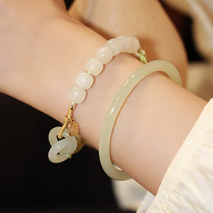 Pulsera trenzada con cuentas de jade hetiano natural de Buda y doble hebilla de paz con carácter Fu 