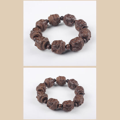 Buddha Stones Adlerholz Buddha geschnitzt Ruhe Armband 