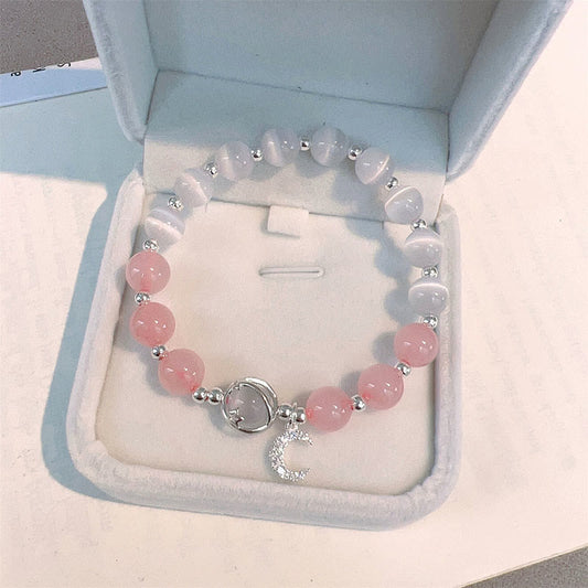 Pulsera con dije de luna de amor y cristal rosa ojo de gato natural de Buddha Stones