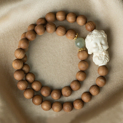 Pulsera protectora de piedras de Buda, sándalo, jade hetiano, marfil y fruta de Tara verde 