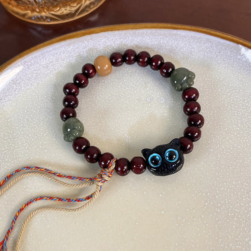Pulsera de madera con borlas de la paz, con piedras de Buda, madera de ébano y pata de jade de gato encantador 