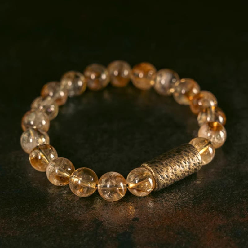 Pulsera protectora de cuentas de latón con cristales de citrino natural de Buddha Stones 