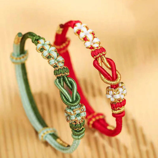Pulsera de protección de la suerte con nudo de paz de ocho hilos con flor de durazno hecha a mano con piedras de Buda 