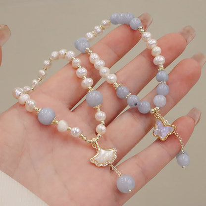 Pulsera con dije de mariposa, hoja de ginkgo y perla de aguamarina natural de Buda 