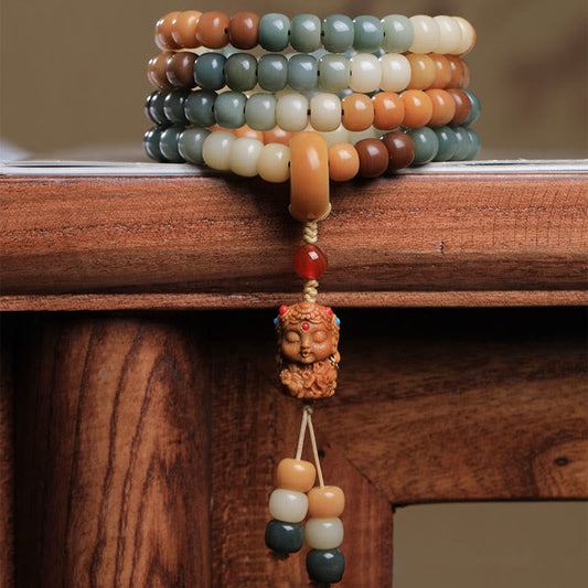 Pulsera de armonía y paz con 108 cuentas de mala con semillas de Bodhi degradadas y Buda Tara verde grabado.
