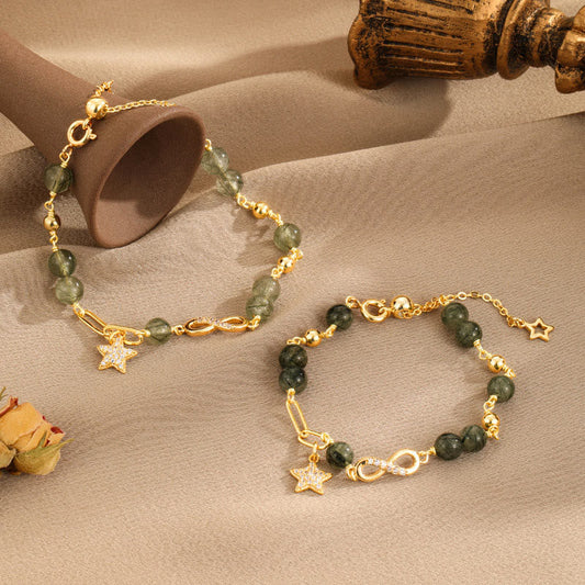 Pulsera de protección de estrellas de amor eterno con lazo de Möbius de cuarzo rutilado verde en oro de 14 quilates de Buddha Stones 