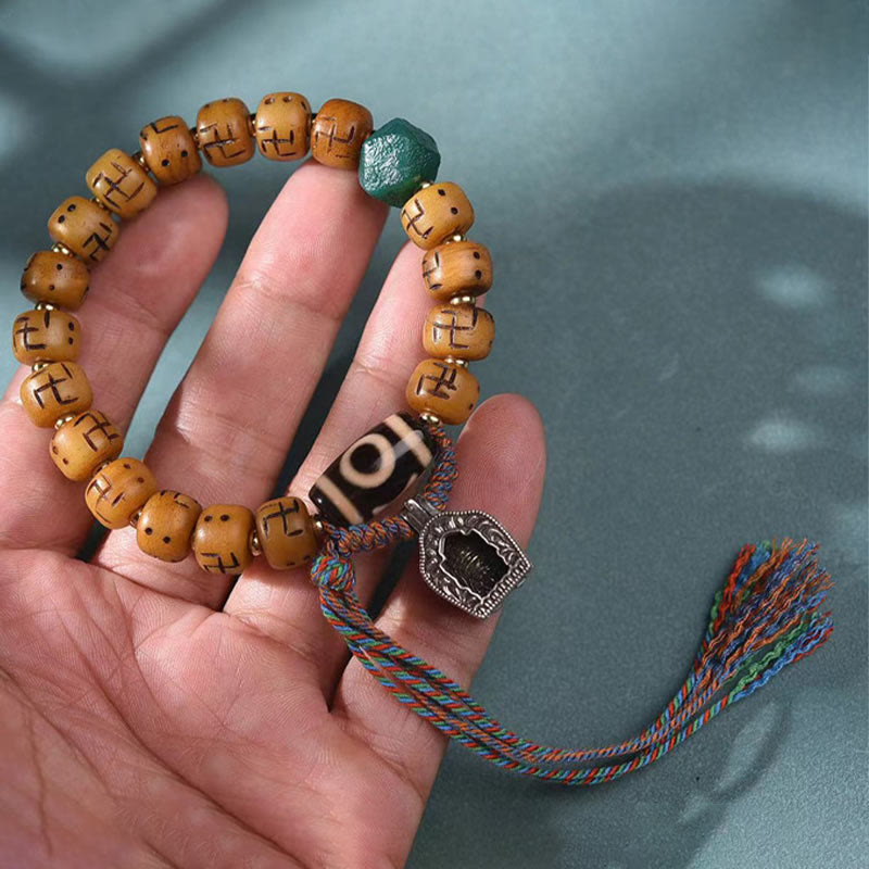 Buddha-Steine, natürliches tibetisches Kamelknochen-Hakenkreuz-Dzi-Perlen-Shankha-Buddha-Charm, Kirtimukha-Glücksschutz-Quastenarmband