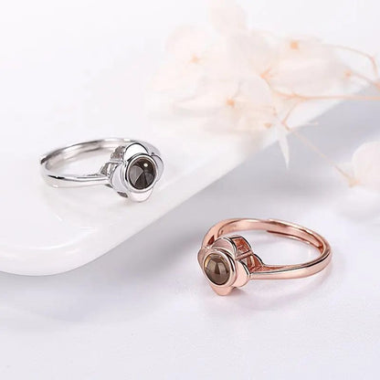 Anillo de flores de cuatro pétalos con proyección de fotos personalizada 