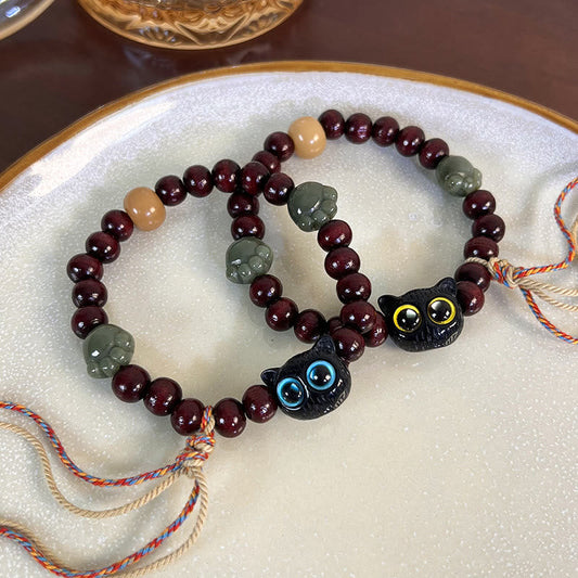 Pulsera de madera con borlas de la paz, con piedras de Buda, madera de ébano y pata de jade de gato encantador 