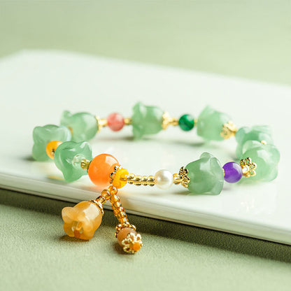 Pulsera de la suerte con flor de magnolia y aventurina verde de Buddha Stones 