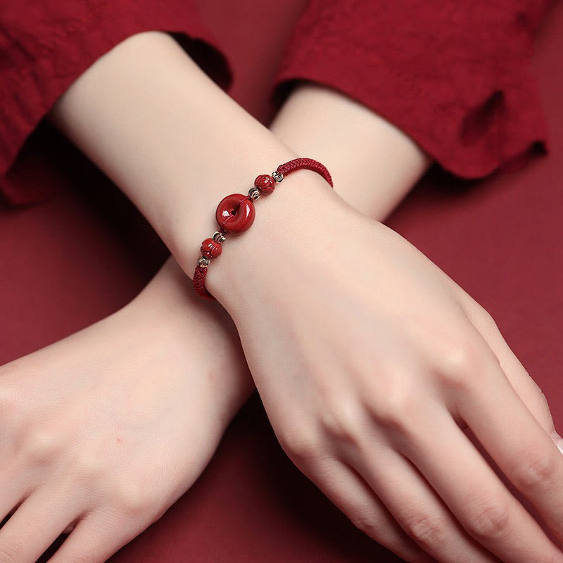 Pulsera trenzada con bendición de paz y cinabrio de loto hecha a mano con piedras de Buda
