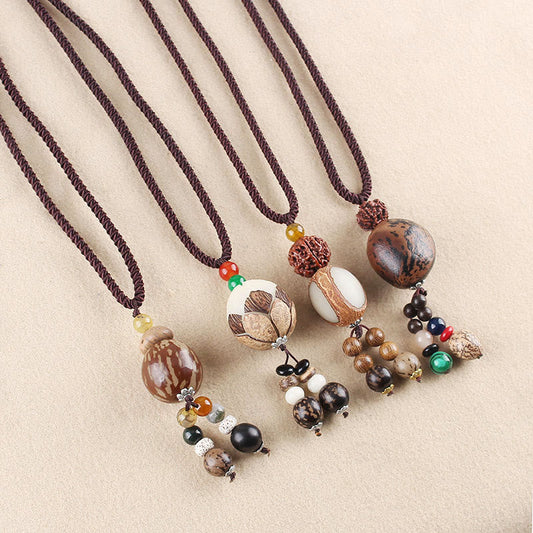 Buddha-Steine ​​Bodhi-Samen Lotus Weisheit Harmonie Halskette Anhänger