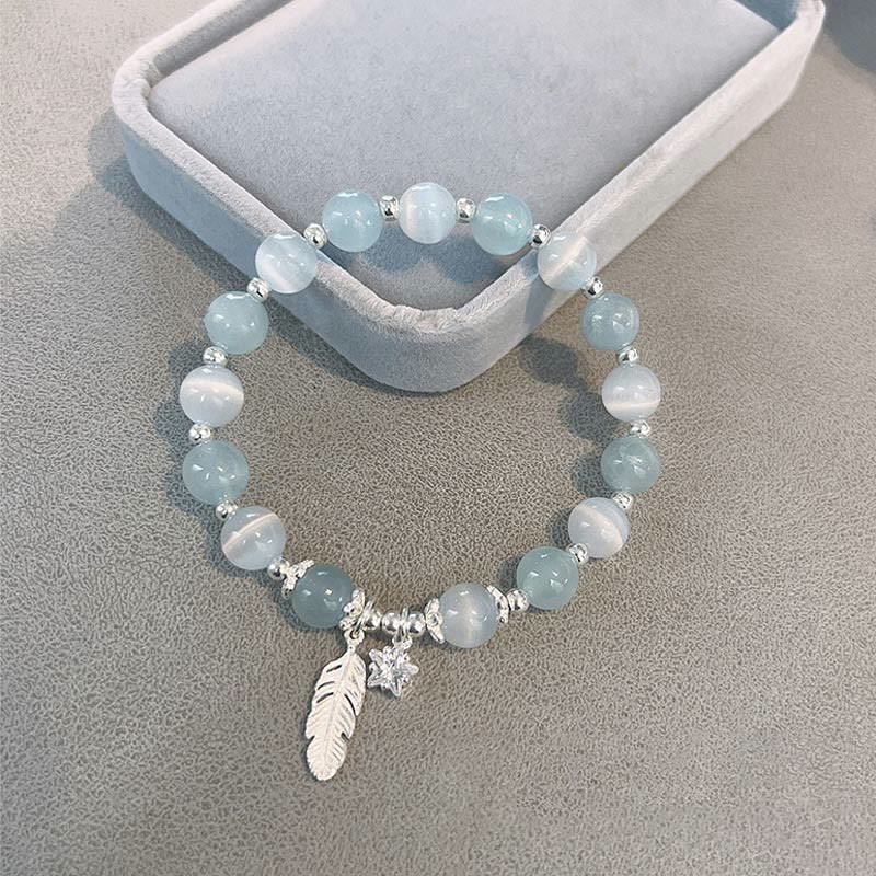 Pulsera con dije de estrella y pluma curativa de ojo de gato y aguamarina en plata de ley 925 con piedras de Buda 