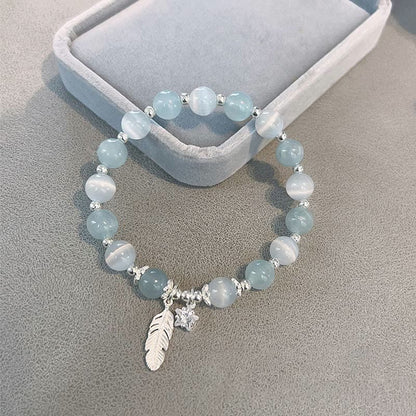 Pulsera con dije de estrella y pluma curativa de ojo de gato y aguamarina en plata de ley 925 con piedras de Buda 