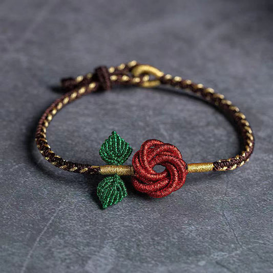 Pulsera hecha a mano con ocho hilos de nudo de la paz y flor de rosa con piedras de Buda