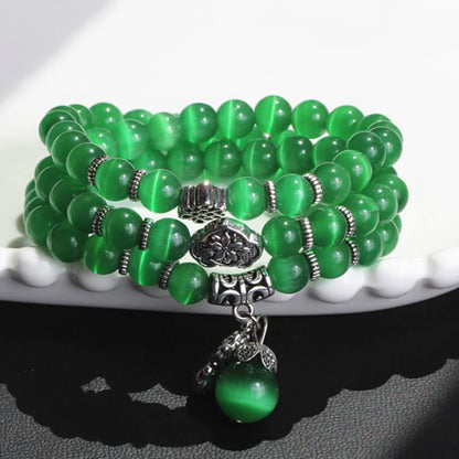 Pulsera triple vuelta con soporte PiXiu de ojo de gato y piedras de Buda