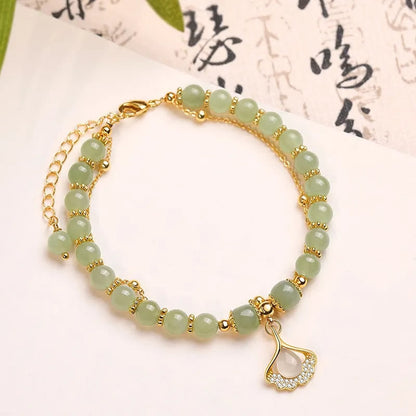 Pulsera de cuentas con piedras de Buda, hojas de jade, ginkgo, tulipán, cacahuete y carácter Fu, con la suerte