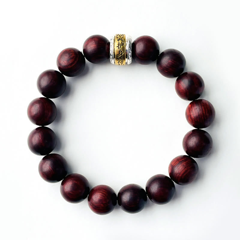 Pulsera protectora con amuleto de sándalo rojo y hojas pequeñas de Buda 
