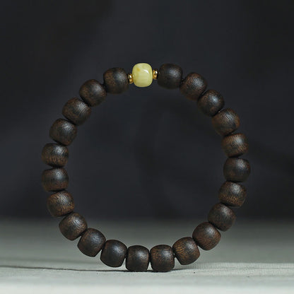 Buddha Stones Seltenes Brunei-Adlerholz-Bernstein-Armband mit Balance, Frieden und Ruhe