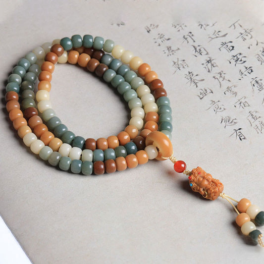 Pulsera de armonía y paz con 108 cuentas de mala con semillas de Bodhi degradadas y Buda Tara verde grabado.
