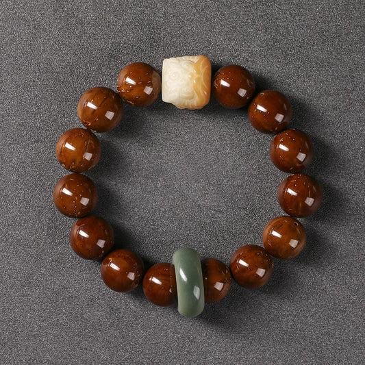 Pulsera de la sabiduría del león danzante con semillas de bodhi moradas y piedras de Buda