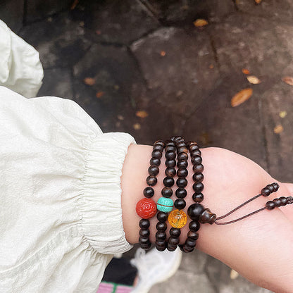 Buddha Stones Nha Trang Bai Qinan Agarwood Turquoise Amber Red Agate Strength Meditation Bracelet