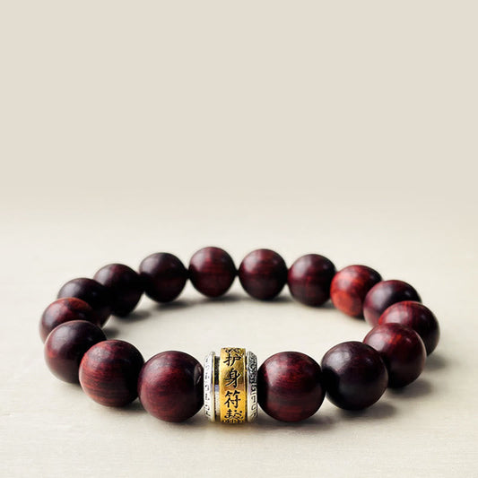 Pulsera protectora con amuleto de sándalo rojo y hojas pequeñas de Buda 
