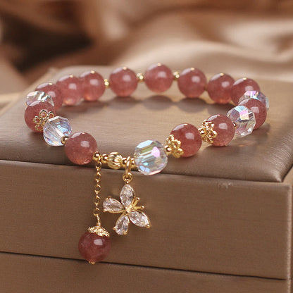Pulsera con dije de mariposa curativa de cuarzo fresa natural de Buddha Stones 