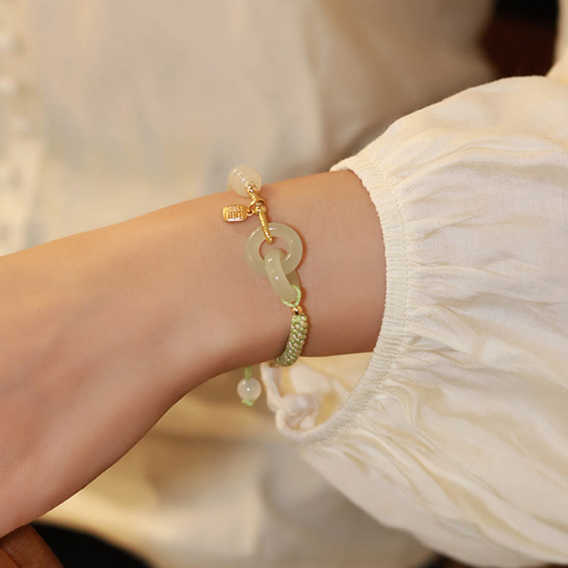 Pulsera trenzada con cuentas de jade hetiano natural de Buda y doble hebilla de paz con carácter Fu 