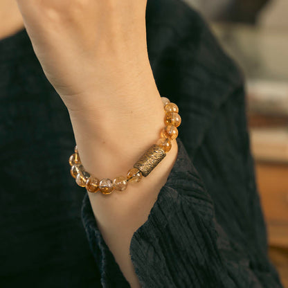 Pulsera protectora de cuentas de latón con cristales de citrino natural de Buddha Stones 