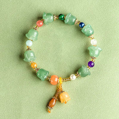 Pulsera de la suerte con flor de magnolia y aventurina verde de Buddha Stones 