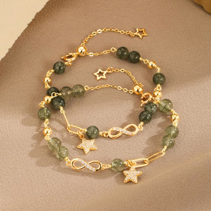 Pulsera de protección de estrellas de amor eterno con lazo de Möbius de cuarzo rutilado verde en oro de 14 quilates de Buddha Stones 