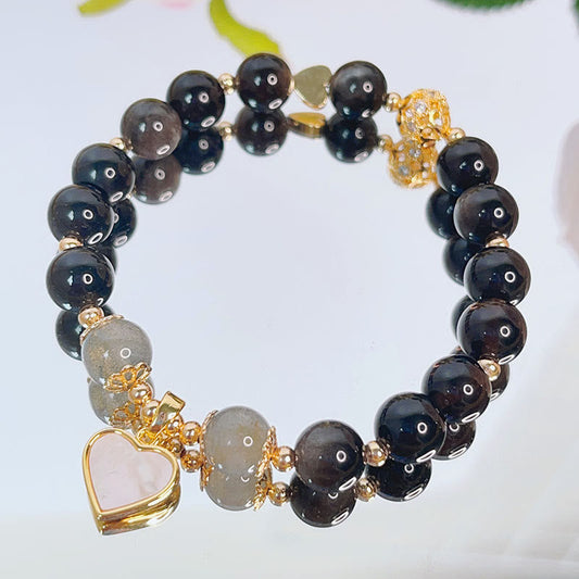 Pulsera de protección con obsidiana, corazón, estrella y flor de plata natural con piedras de Buda