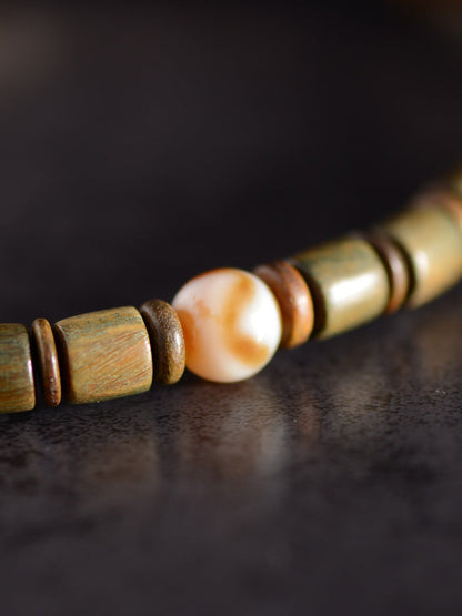 Tiger Tooth Dzi Tibetan Sandalwood Bracelet