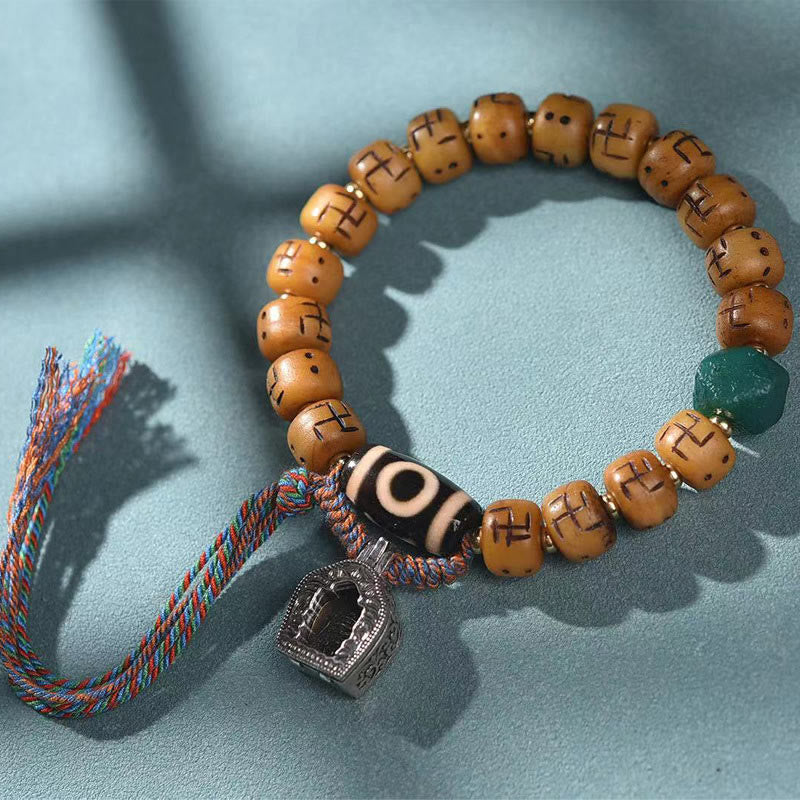 Buddha-Steine, natürliches tibetisches Kamelknochen-Hakenkreuz-Dzi-Perlen-Shankha-Buddha-Charm, Kirtimukha-Glücksschutz-Quastenarmband