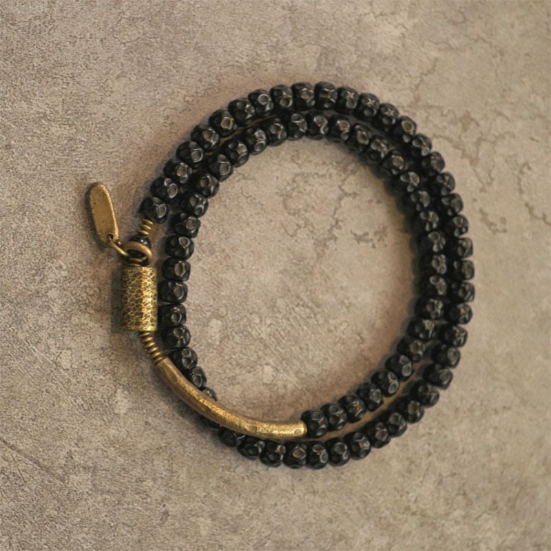 Pulsera de triple vuelta de cobre con cáscara de coco retro de Buddha Stones 
