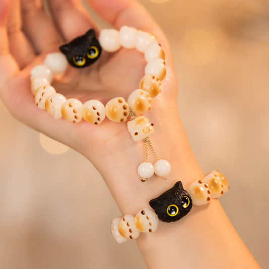 Pulsera de la paz con semillas de bodhi naturales de Buda, sándalo rojo, gato de la suerte y pata encantadora 