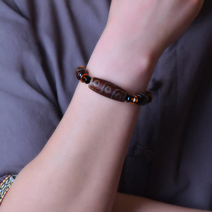 Pulsera tibetana retro de cuentas Dzi de nueve ojos con bendiciones de piedras de Buda 