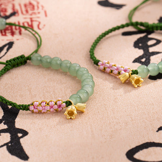 Pulsera trenzada con cuentas de jade de Buda, hecha a mano, con amuleto de lirio de los valles y la suerte