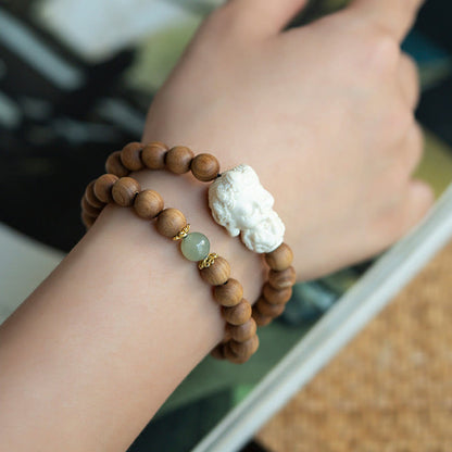 Pulsera protectora de piedras de Buda, sándalo, jade hetiano, marfil y fruta de Tara verde 