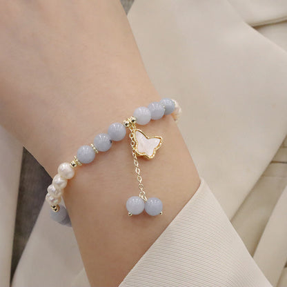 Pulsera con dije de mariposa, hoja de ginkgo y perla de aguamarina natural de Buda 