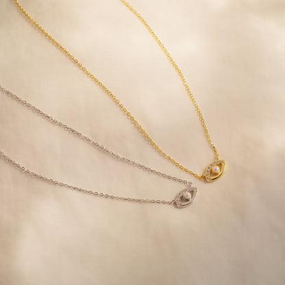Collar de mal de ojo con amaryllis pavé
