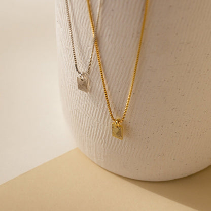 Mini collar con placa de huellas dactilares