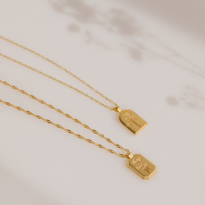 Collar con arco de flores de nacimiento
