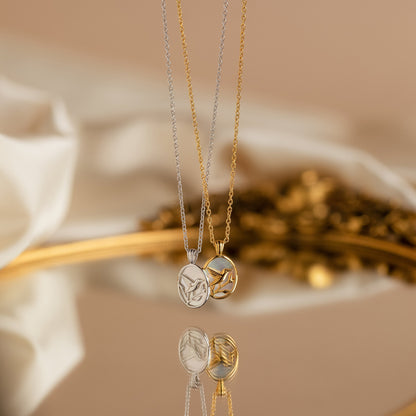 Collar de colibrí con perlas