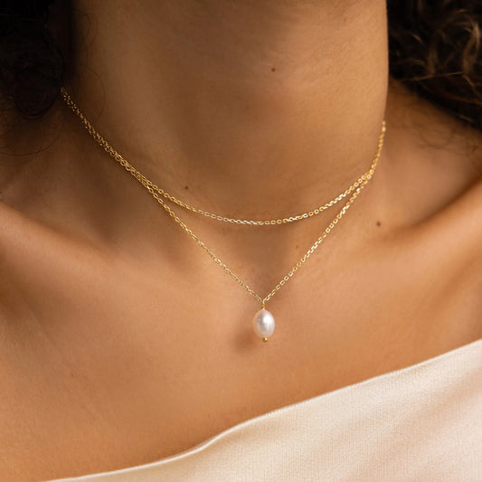 Collar de perlas con cadena doble