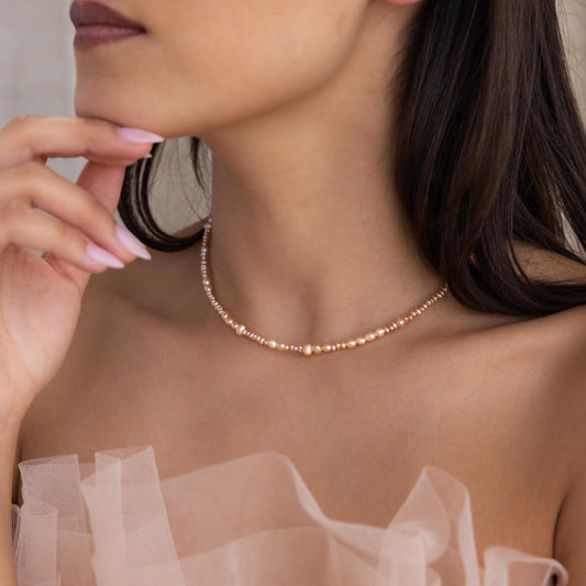 Collar de perlas ruborizadas