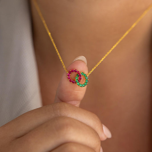 Collar con dos piedras de nacimiento entrelazadas